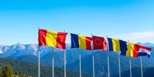 Fotografie a peisajului românesc cu steaguri internaționale.